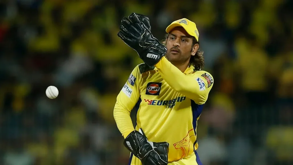 MS Dhoni throwing ball with keeping style csk match