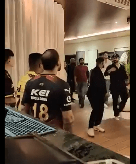 Virat-Kohli-reaction-on-csk-jersey-on-his-own-resturant-
